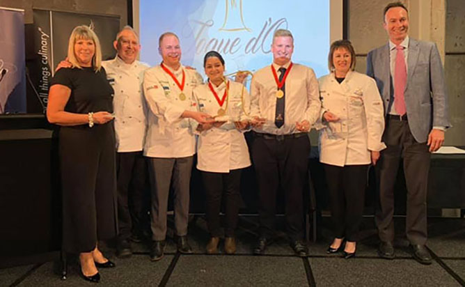 Ara’s Toque d’Or team plated up gold.jpg