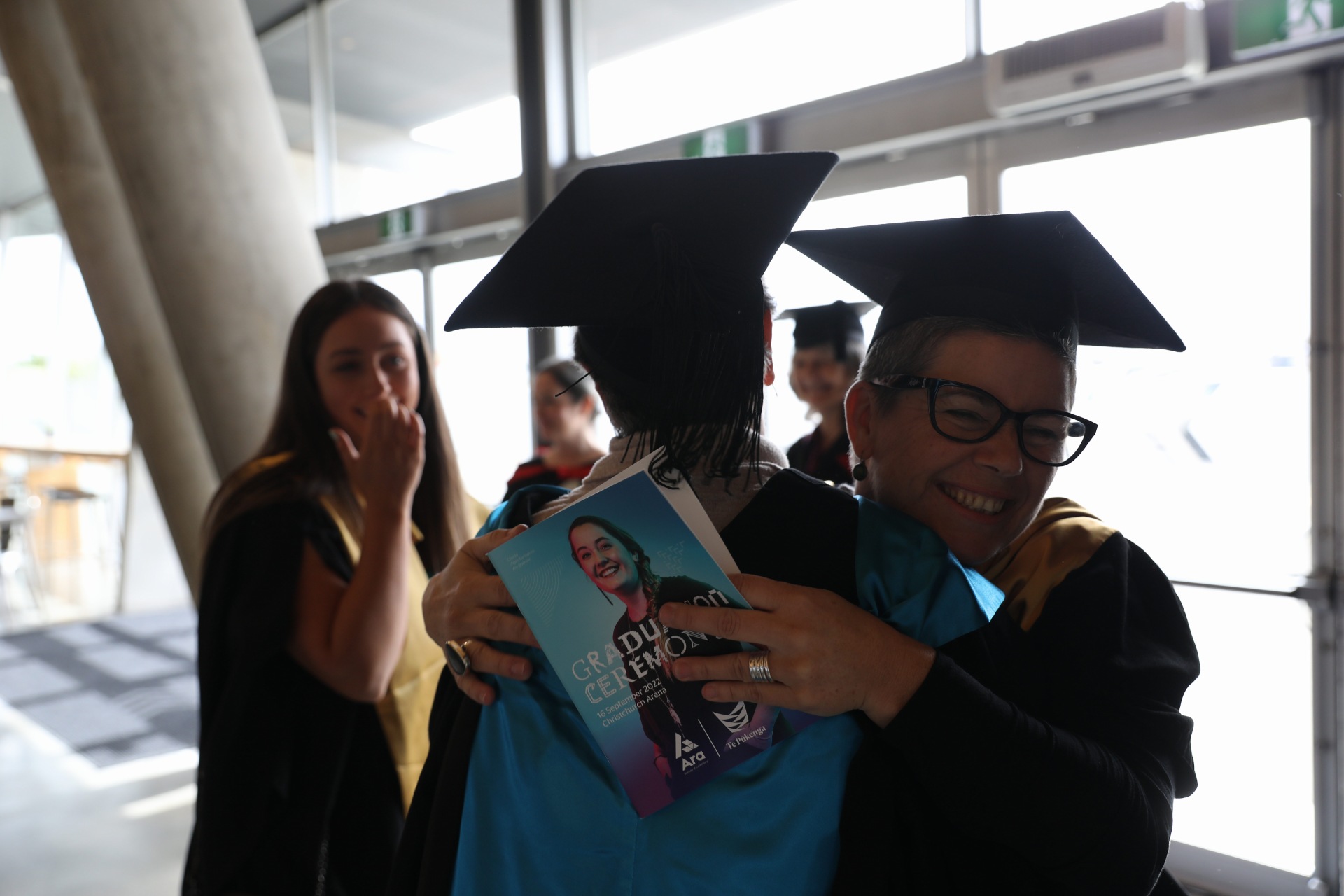 Grad Lead Hugs.JPG